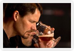 Panel member Alex sampling a beer